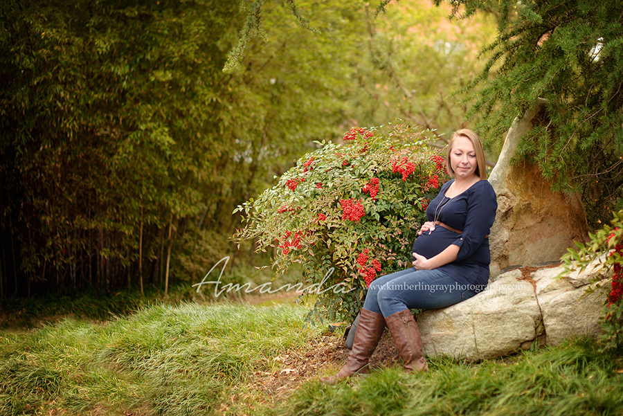 outdoor pregnancy photo with flower background