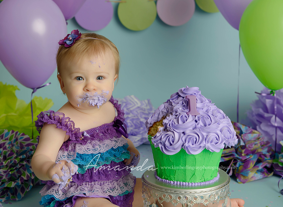 green and purple pom pom cake smash